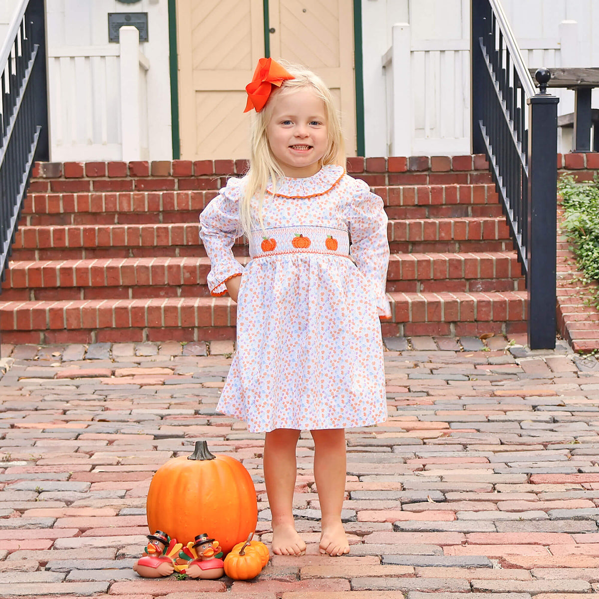 Pumpkin Smocked Blue Floral Ruffle Collared Dress