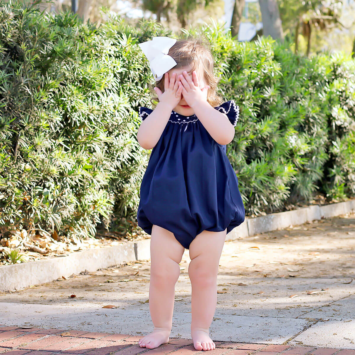 White Geometric Vine Smocked Bubble Navy Pique