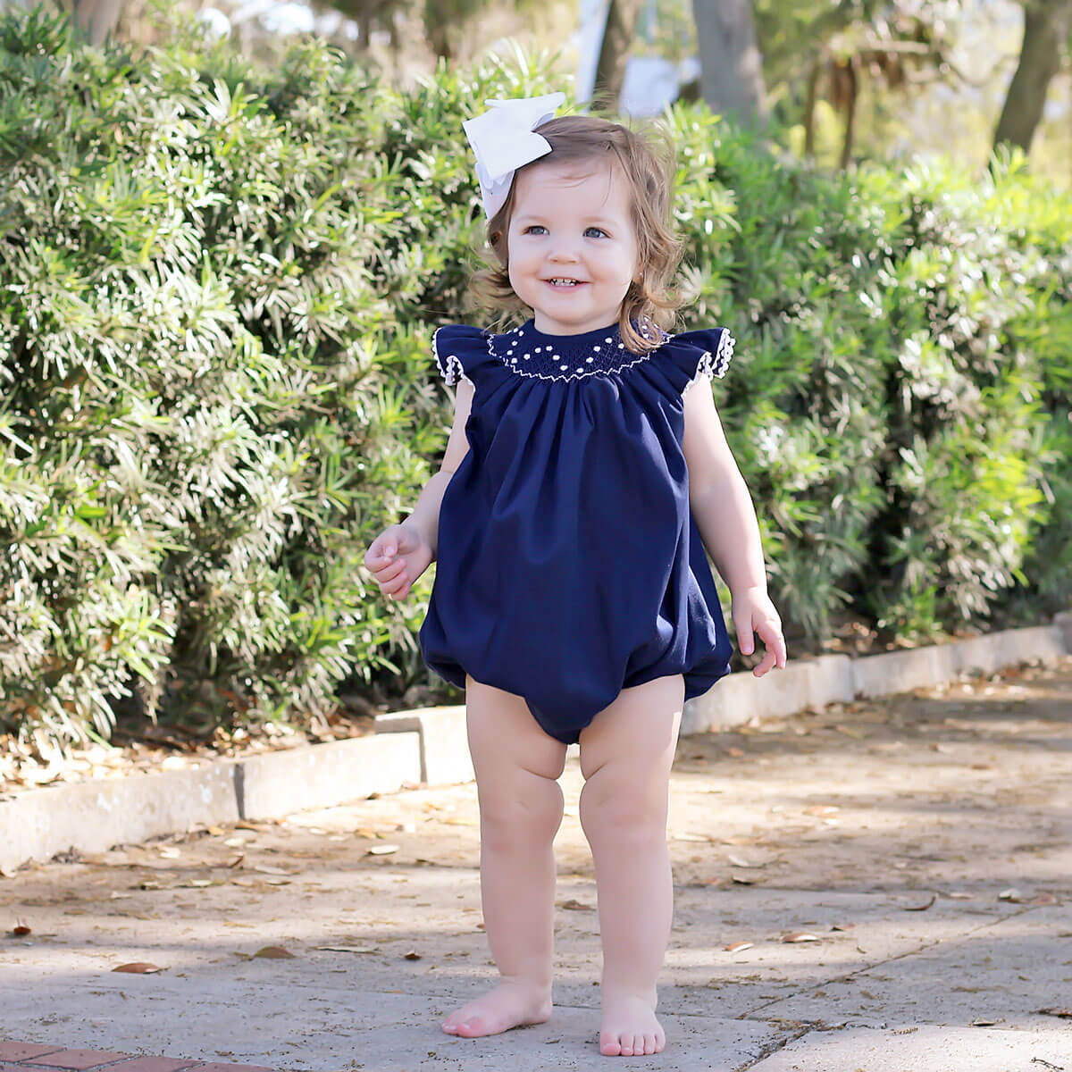 White Geometric Vine Smocked Bubble Navy Pique