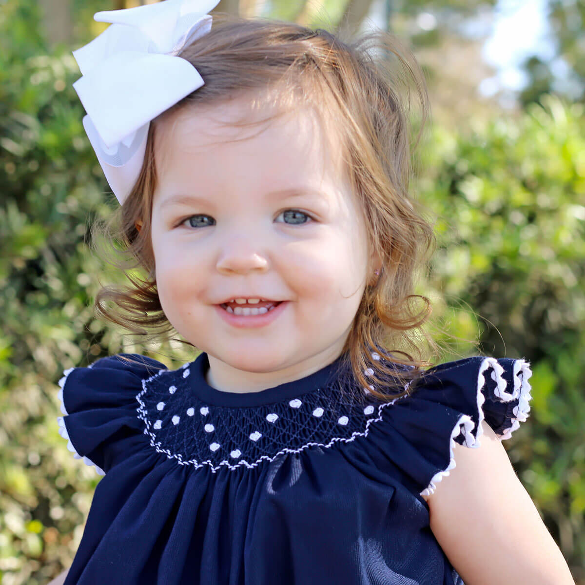 White Geometric Vine Smocked Bubble Navy Pique