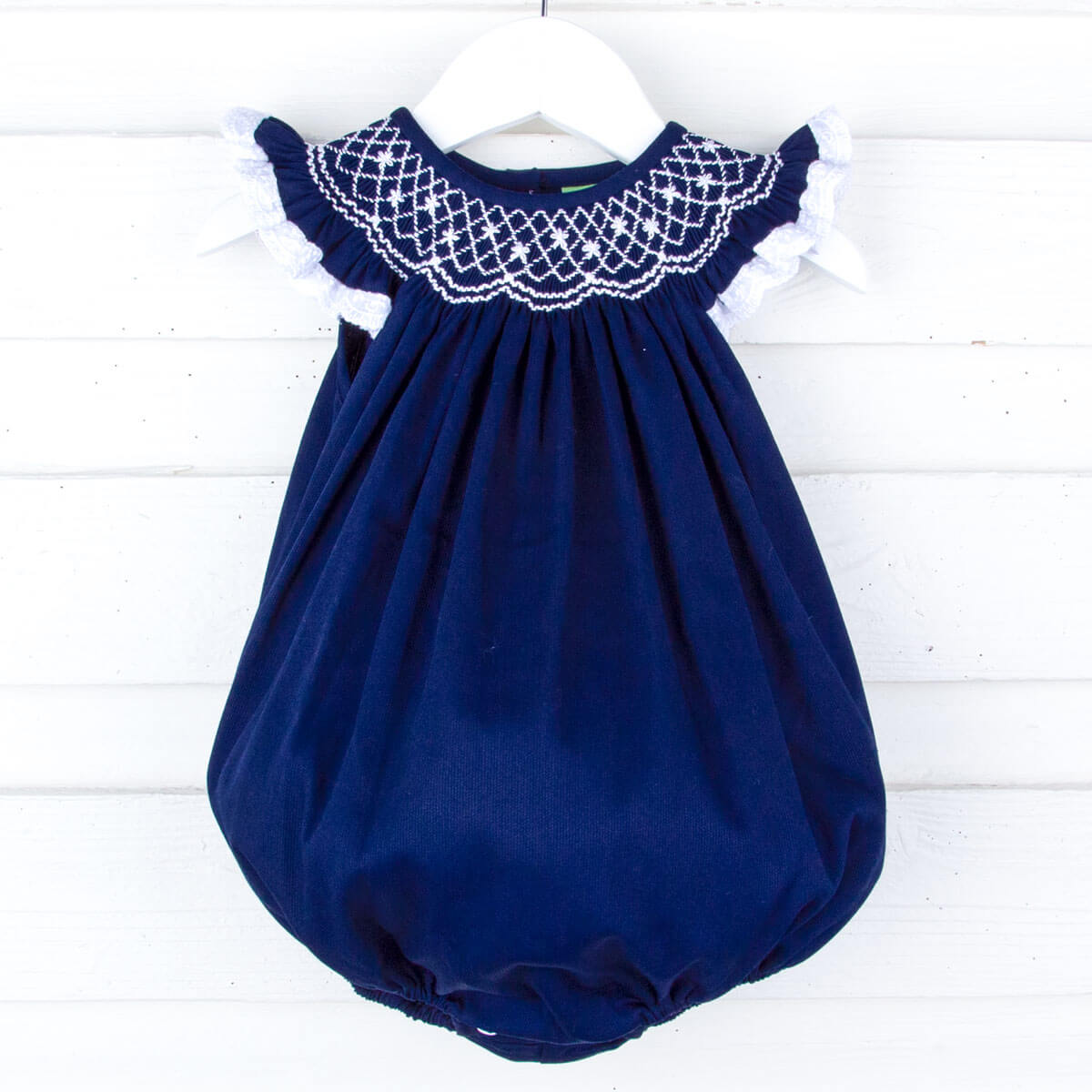 navy blue toddler dress Navy Pique And White Smocked Geo Angel Sleeve Bubble – Classic Whimsy