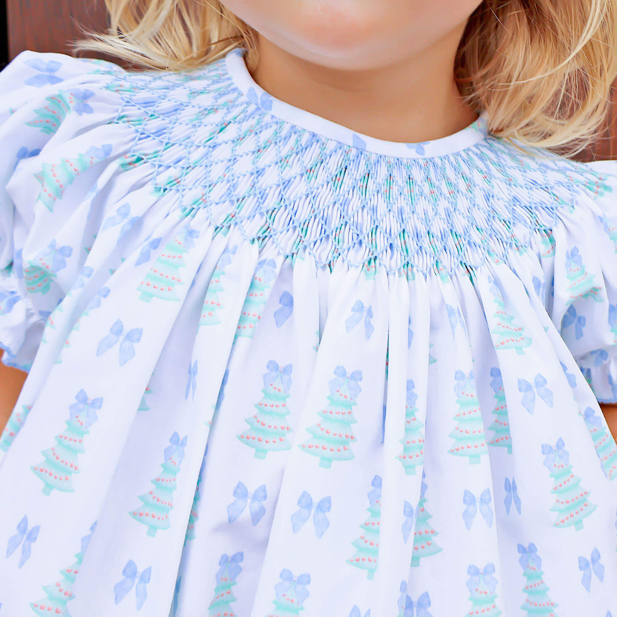 Christmas Tree Bow Blue Smocked Bishop Bubble