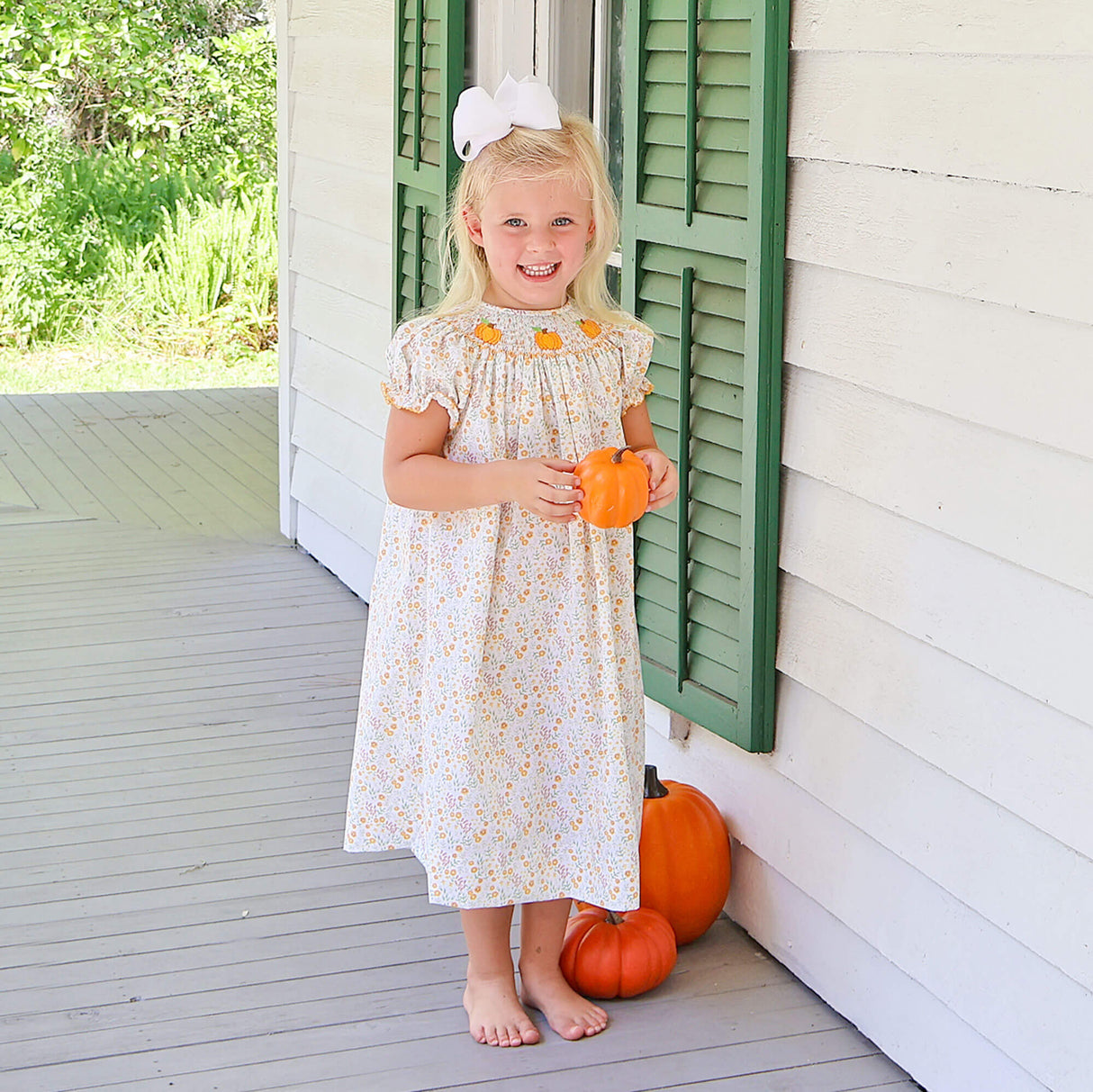 Autumn Petal Pumpkin Smocked Bishop Dress