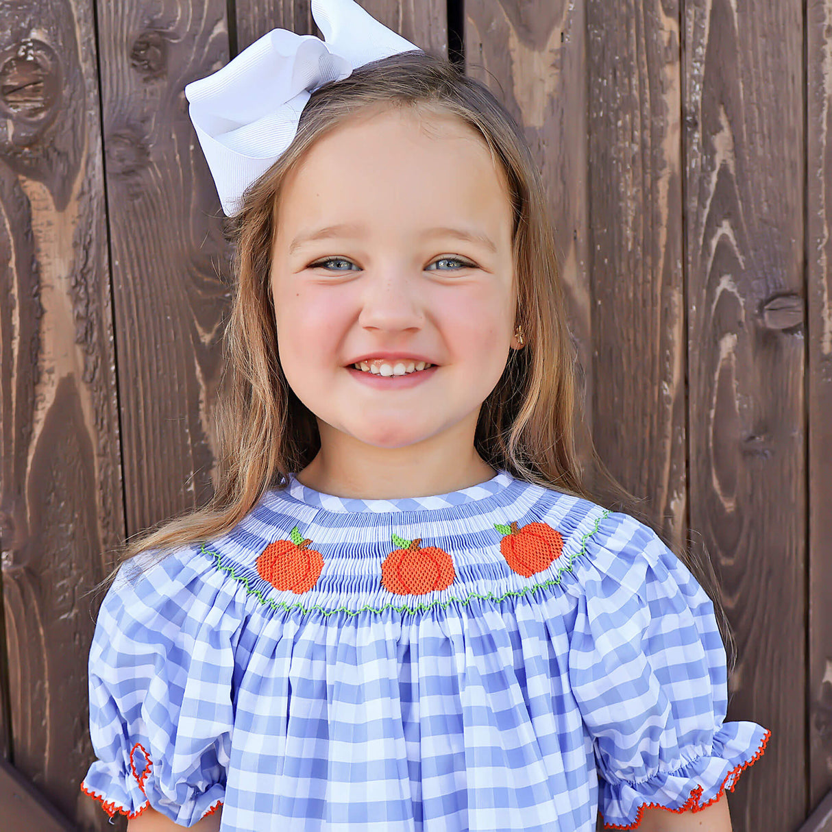 Pumpkin Smocked Light Blue Check Bishop Dress