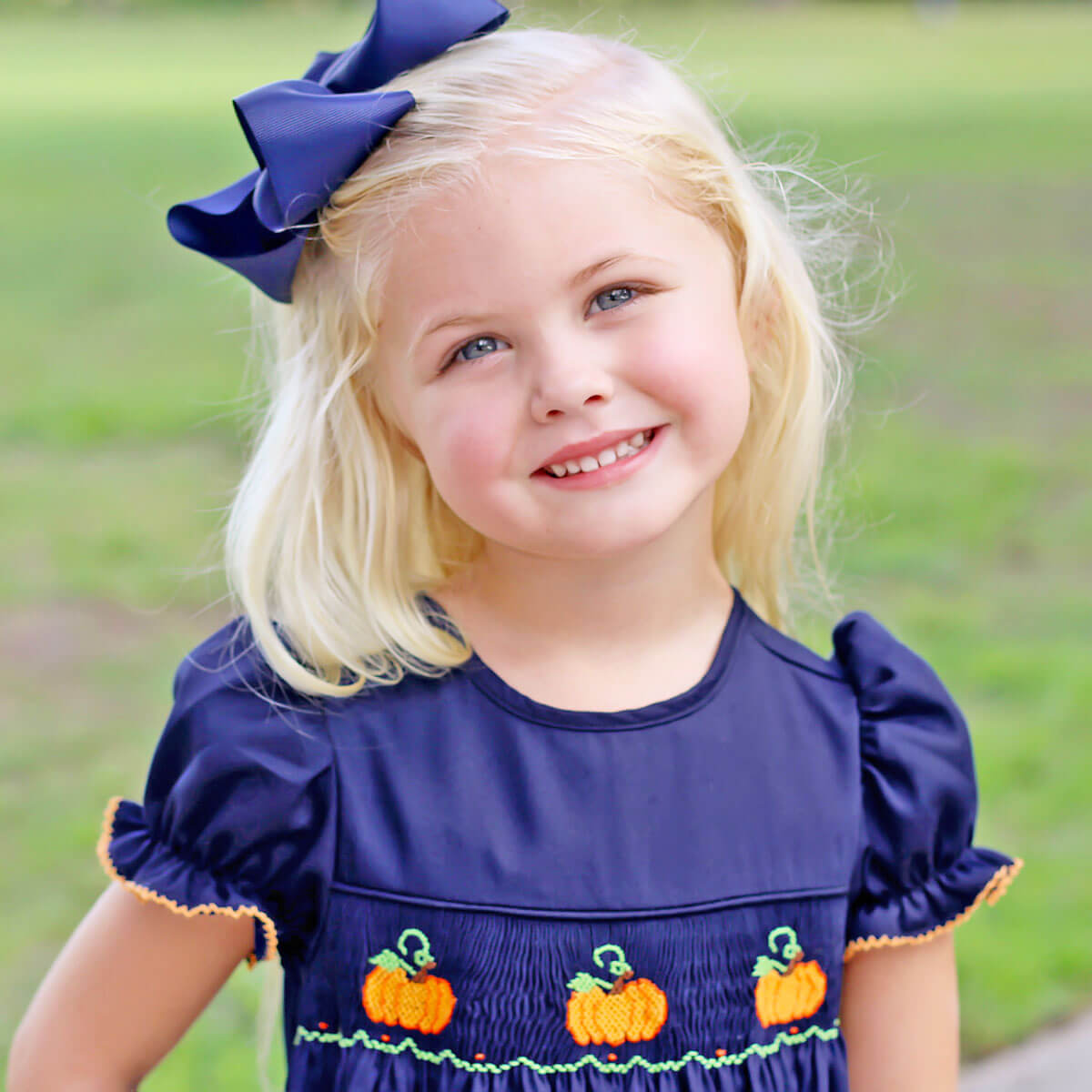 Smocked Pumpkin Navy Dress