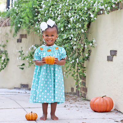 Smocked Pumpkins Aqua Ikat Dress